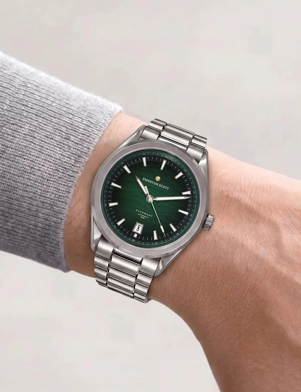Emerton Scott Evermont watch on the wrist, showing the green dial, stainless steel bracelet, and finishing choices that shape the everyday wearing experience.